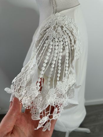 Blouse blanche et broderies ajourées T40 L