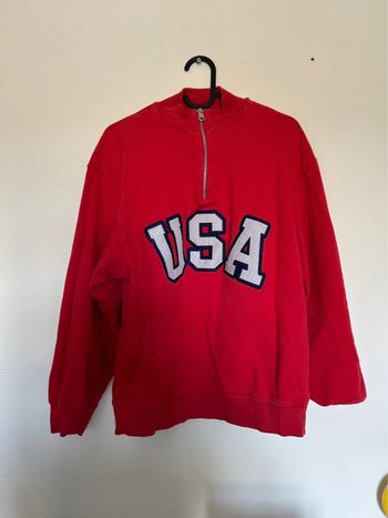 Pull col roulé