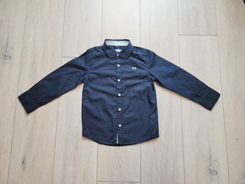 Tres belle chemise bleu à motif blanc. Garçon 6 ans. Marque Gémo