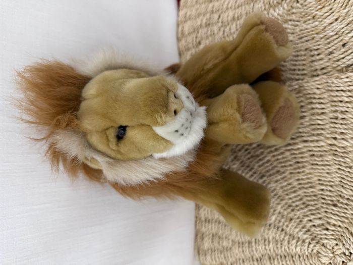 doudou lion poignée et fermeture CP