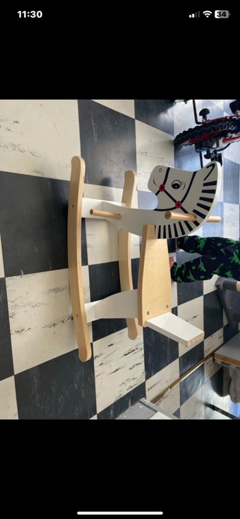 Cheval à bascule en bois