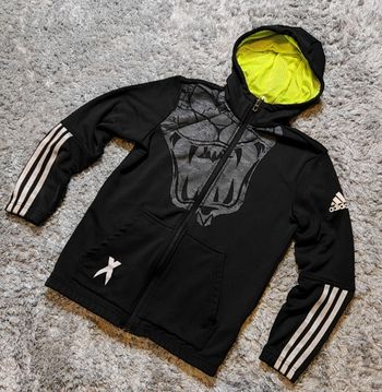 Veste zip capuche noire et jaune Adidas - Très bon état - 11/12 ans