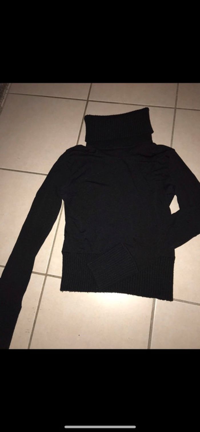 Pull col roulé