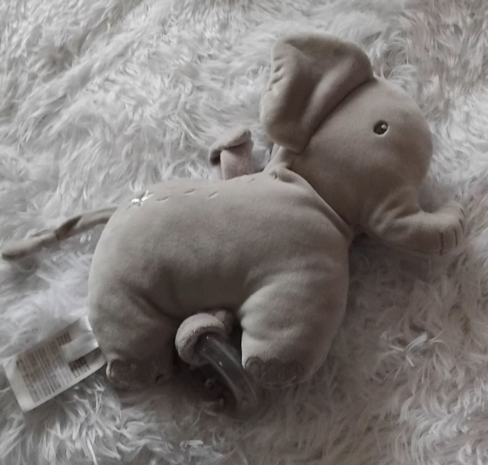 Doudou peluche musical éléphant gris étoile argenté- anneau - Mots d Enfants