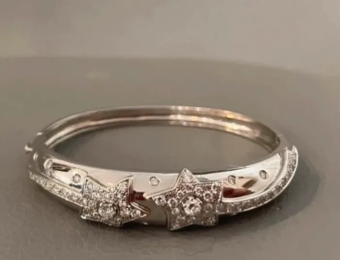 Bracelet rigide jonc en véritable argent et strass  Excellent état