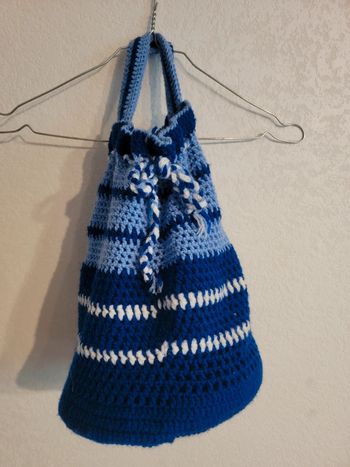 Jolie petit baluchon en laine maille vintage old money