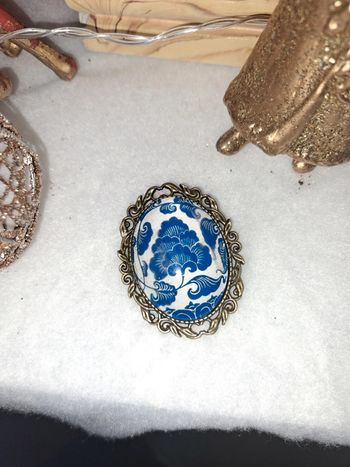 Broche bleu et blanche acier inoxydable