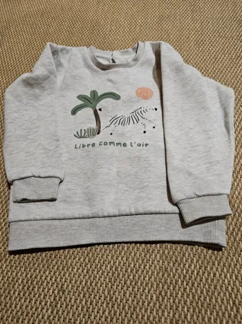 Pull 3 ans tape à l'œil