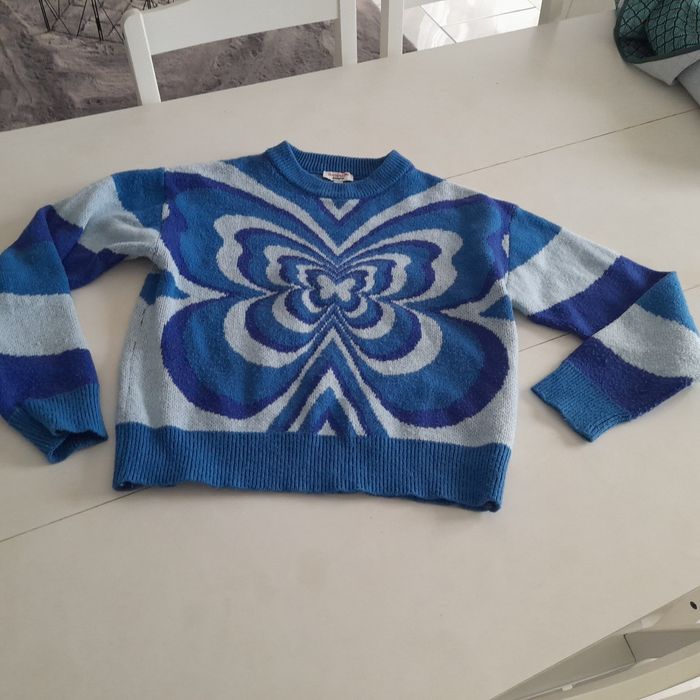 Pull bleu moti effet psychédélique