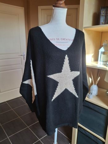 Pull noir étoile dorée