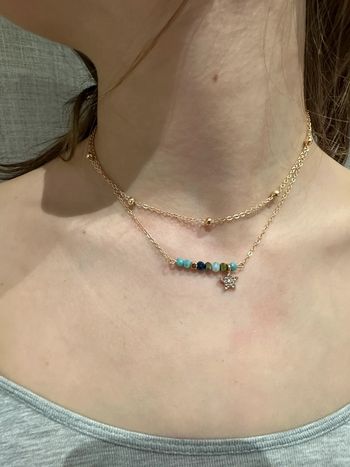 Collier superposé en doré et perles cristal neuf