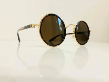 Lunette de soleil mixte ronde marron léopard et dorée uvprotection catégorie 3