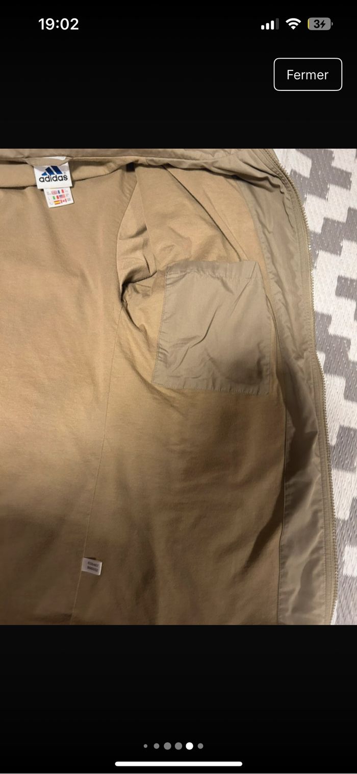 Veste adidas très bonne état une petite tache derrière voir sur la photo taille 48 - photo numéro 6