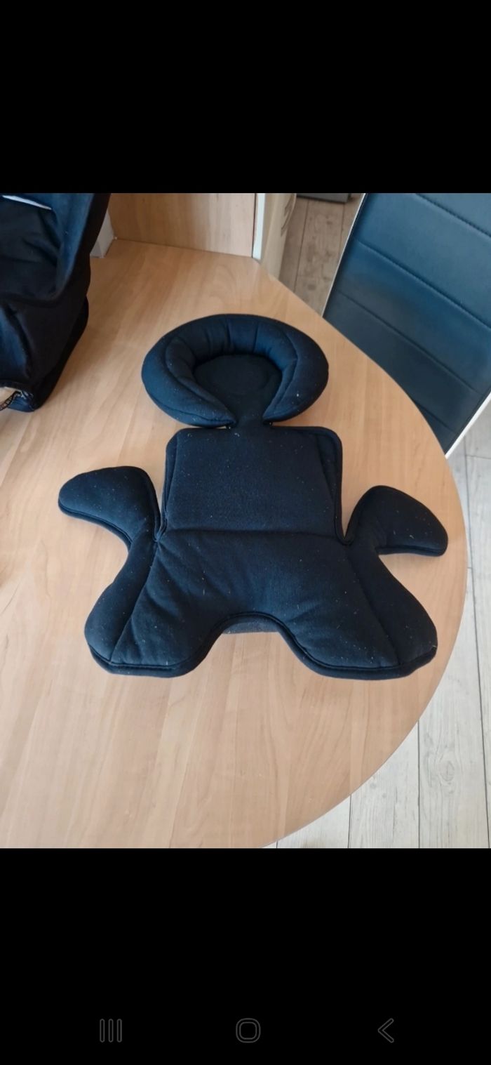 Réducteur de siège auto