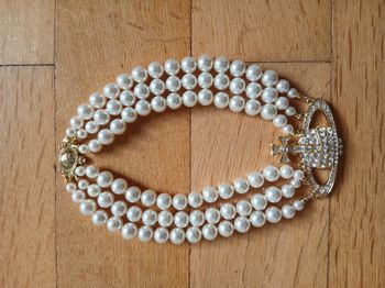 Collier trio perle  or vivienne westood 