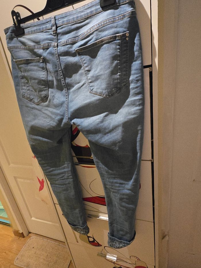 Jean droit bleu délavé à revers léopard T.44/46 Gémo - photo numéro 3