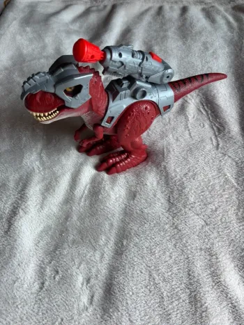 🌺Dinosaure motorisé et sonore lanceur de flèche 🌺