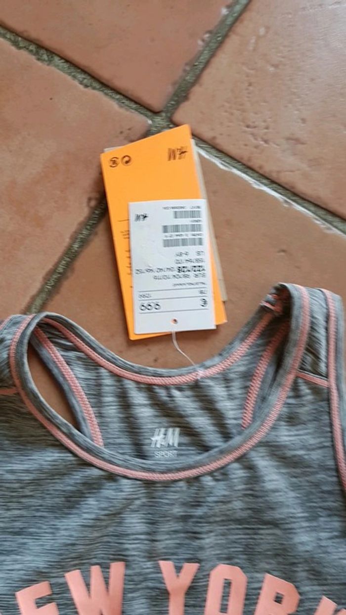 Débardeur 6/8ans neuf h et m