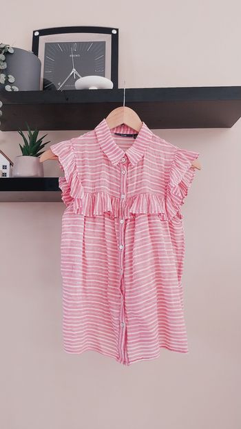 Blouse à volants sans manches 