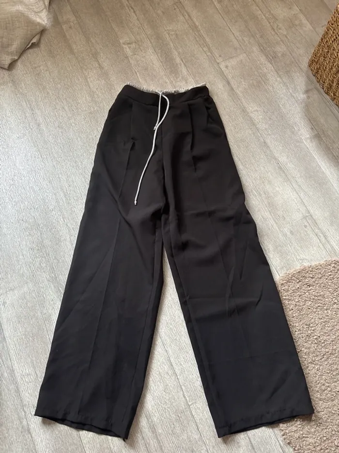 Pantalon jambes larges