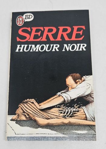 "Humour noir", de Serre.
J'ai lu BD.
ISBN : 2.277.33035.3.