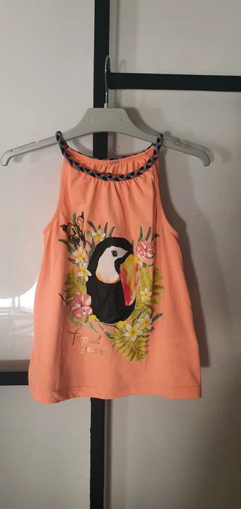 Débardeur corail. 7ans