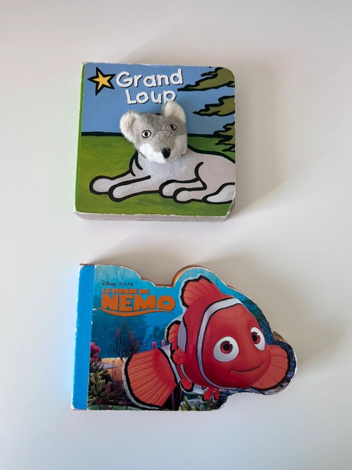 Lot de 2 livres le monde de Nemo et grand loup