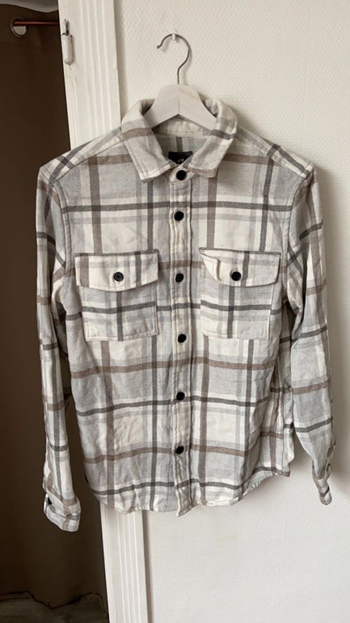 Veste carreaux grise et blanche