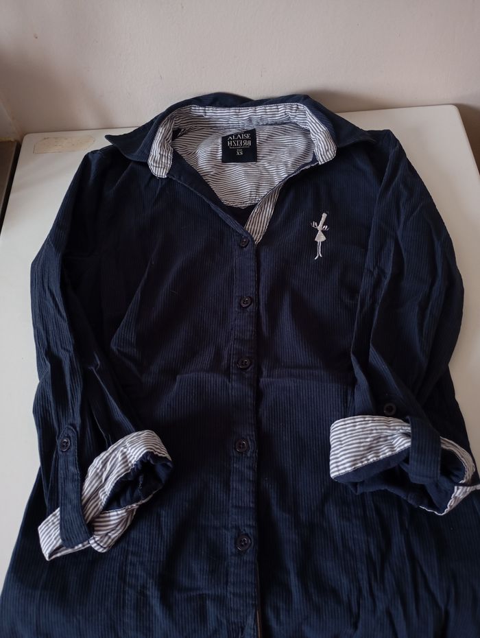 Chemise marine. Rayures .Manches longues . T34 XS. Cotin polyamide elasthane . Très bon état
