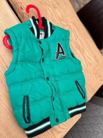 Veste manteau  doudoune sans manches verte orchestra 6 ans