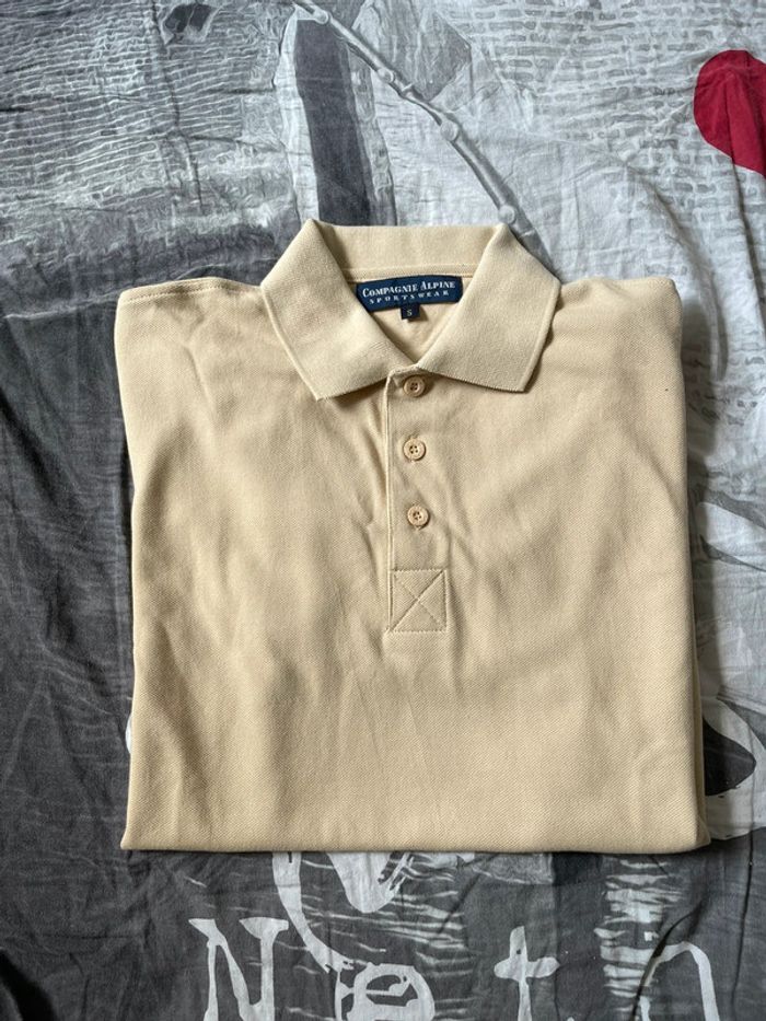 Polo beige/jaune taille S compagnie Alpine sportswear