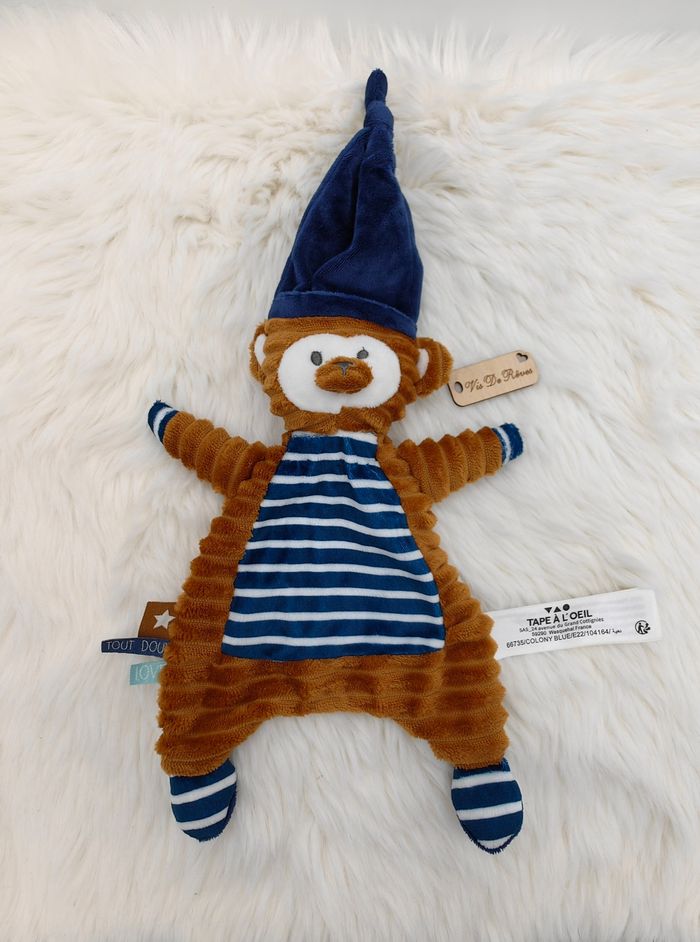 Doudou plat Singe Marron et bleu TAO Tape à L'Oeil