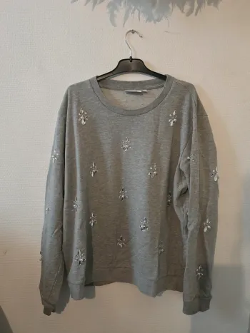 Pull avec perles