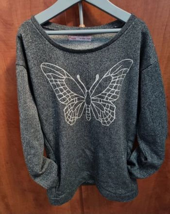 Pull pailleté avec motif papillon avec  poches 12ans