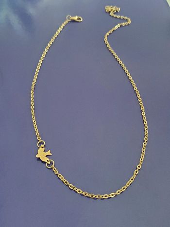 Collier dore chaine et colombes