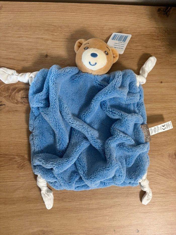 Neuf doudou plat ours plume bleu indigo kaloo - photo numéro 2