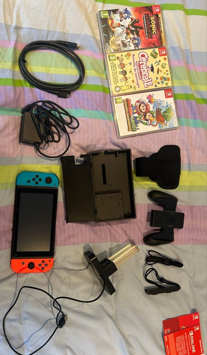 Nintendo switch neuve avec 3 jeux