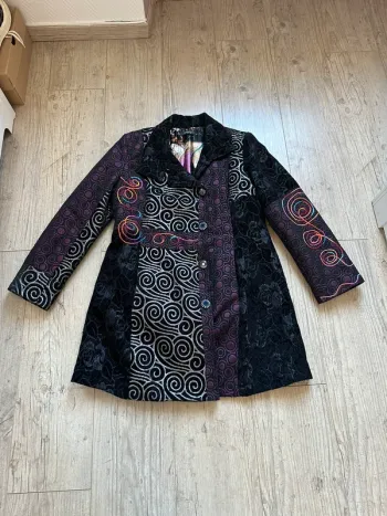 Manteau texto