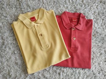Lot de 2 polos rouge pâle et jaune pâle