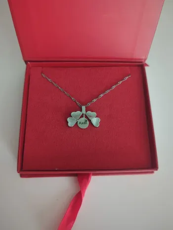 Collier porte bonheur trèfle prénom Axel