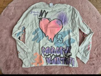 Pull blanc avec motif