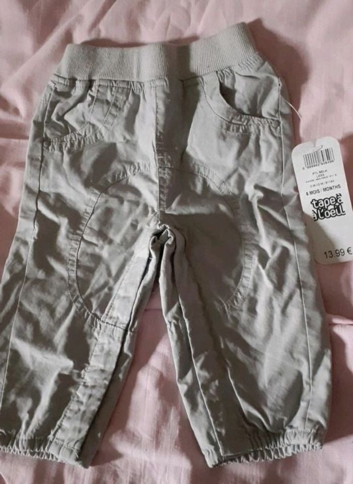 Pantalon tape a l oeil neuf 6 mois