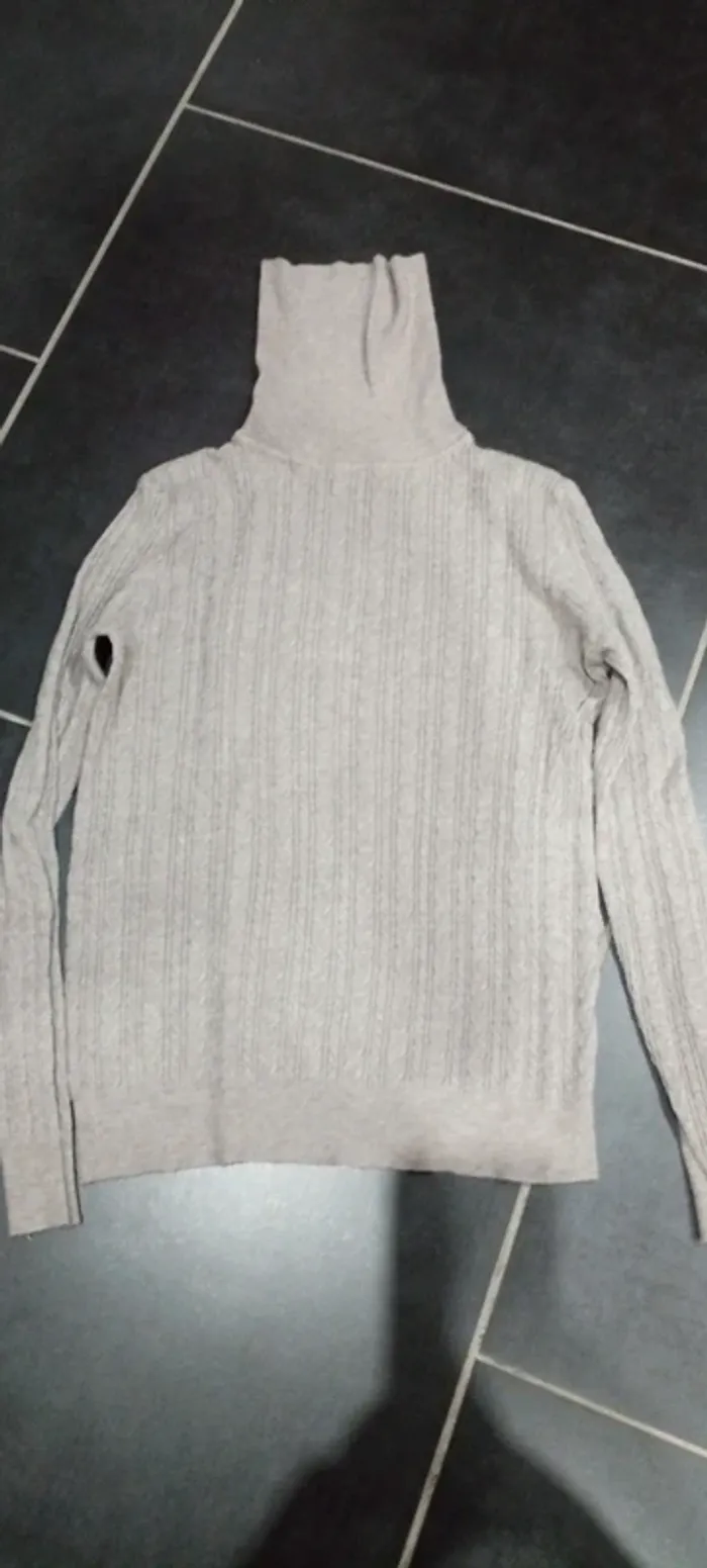 Pull con roulé