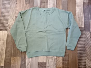 Pull vert taille L