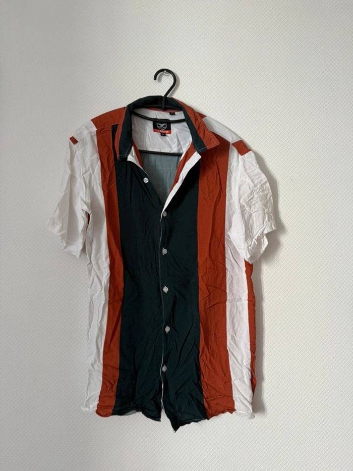 Chemise manche courte en très bon état taille M le brève