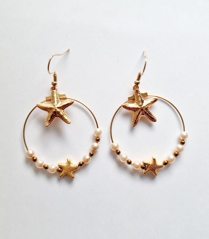 Boucle d'oreille étoile de mer en acier inoxydable