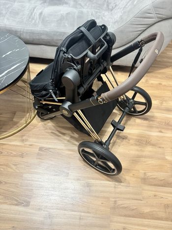 Poussette Cybex Platinum Priam (or rose) avec pack de sièges S22AJUFI0448