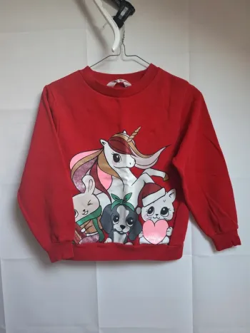 Pull taille 6.8 ans