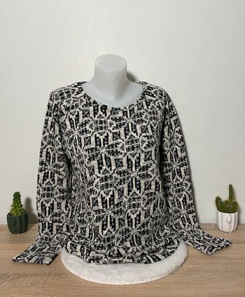Pull noir et blanc à motif géométrique