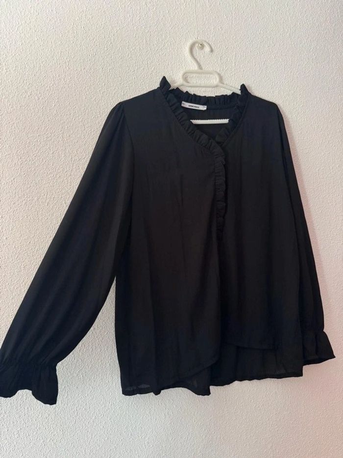 Blusa negra